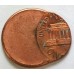 UNITED STATES OF AMERICA 1991 . ONE 1 CENT COIN . ERROR . 70% MIS-STRIKE